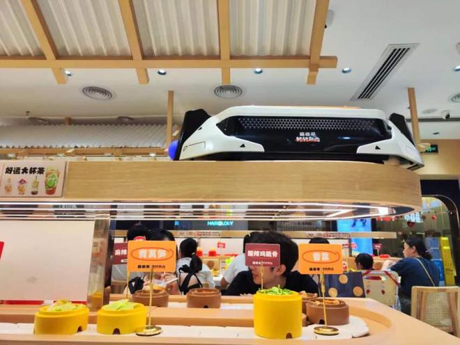 威尼斯wns·8885566聚焦商务宴请、团建会餐海底捞开出首家包间店(图4)